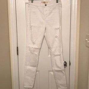 Distressed white skinny jeans